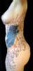 Orchids and Feathers tattoo repair and add-on by Seattle Tattoo Artist Jeremy Garrett_1